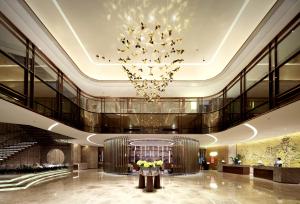 Vstupní hala nebo recepce v ubytování White Swan VYV Hotel, Foshan + 37 fotografií