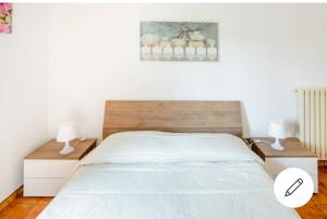 Postel nebo postele na pokoji v ubytování B&B Pantarei