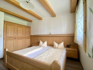 Posteľ alebo postele v izbe v ubytovaní Hotel Landhaus Marchfeld