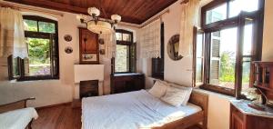 Guesthouse Parthenon房間的床