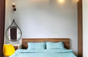 Postel nebo postele na pokoji v ubytování Ngô Gia Home