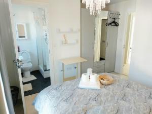 a bedroom with a bed with a teddy bear on it at 3 Guest Rooms in a 3bed house with kitchen, ENSUITE options also available in Telford