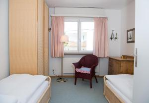 Postel nebo postele na pokoji v ubytování Holiday flat Sundrella for 4 persons Lenzerheide centre