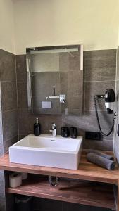 Koupelna v ubytování Ferienwohnungen LODGE-B + 37 fotografií