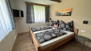 Postel nebo postele na pokoji v ubytování Ferienwohnungen LODGE-B