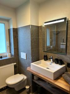 Koupelna v ubytování Ferienwohnungen LODGE-B