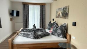 Postel nebo postele na pokoji v ubytování Ferienwohnungen LODGE-B