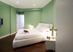 Кровать или кровати в номере The One Prati Rooms
