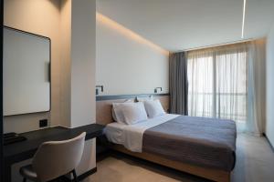 Postel nebo postele na pokoji v ubytování Nema Hotel Athens