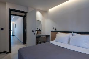 Postel nebo postele na pokoji v ubytování Nema Hotel Athens