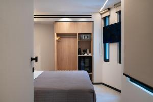 Postel nebo postele na pokoji v ubytování Nema Hotel Athens