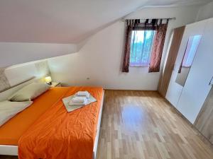 Ένα ή περισσότερα κρεβάτια σε δωμάτιο στο Apartman Milly +30 φωτογραφίες