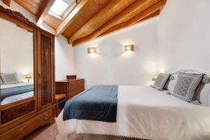 Ένα ή περισσότερα κρεβάτια σε δωμάτιο στο Refúgio dos Pais