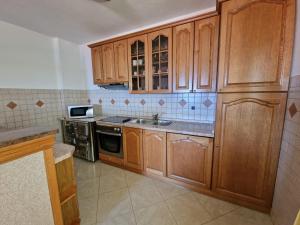 Kuchyň nebo kuchyňský kout v ubytování In Apartment