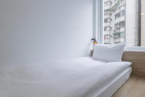 Postel nebo postele na pokoji v ubytování OwlStay Flip Flop Hostel - Garden