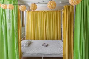 Postel nebo postele na pokoji v ubytování TEJ HOSTEL