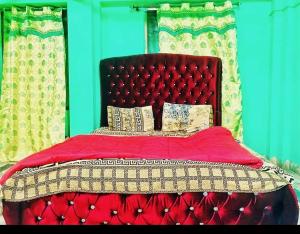 En eller flere senge i et værelse på Kashmir premium hotel