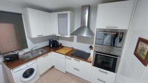 Kuchyň nebo kuchyňský kout v ubytování Vera Albacora IV Chalet