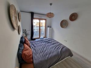 Ένα ή περισσότερα κρεβάτια σε δωμάτιο στο Appart neuf entre Paris et Versailles, A 5 mn école Ducasse