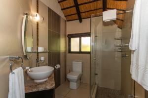 Koupelna v ubytování Kruger Park Lodge Unit No. 209