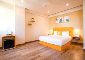 Una cama o camas en una habitación de Bloom Hotel - HSR Layout Sector 3