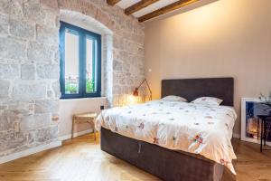 Postel nebo postele na pokoji v ubytování Circle Rooms + 9 fotografií