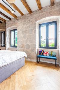 Postel nebo postele na pokoji v ubytování Circle Rooms