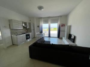 Kuchyň nebo kuchyňský kout v ubytování Nautilus Appartamenti a mare
