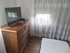TV a/nebo společenská místnost v ubytování Vila Orizont + 10 fotografií
