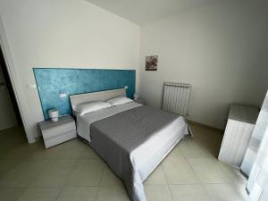 Postel nebo postele na pokoji v ubytování Nautilus Appartamenti a mare