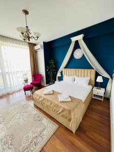 En eller flere senge i et værelse på Luxury Studio Mamaia Nord