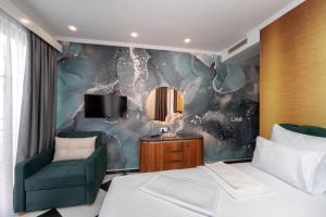 Voodi või voodid majutusasutuse Baba's Hotel & Spa toas