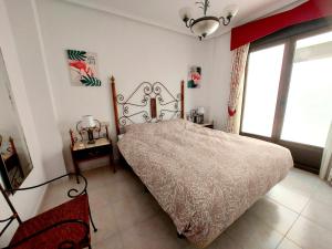 Ένα ή περισσότερα κρεβάτια σε δωμάτιο στο Casa Prins 2-bed apartment with stunning views +14 φωτογραφίες