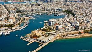 an aerial view of a harbor with boats in the water at Spetson Modern 56sqm apt in Piraeus in Piraeus