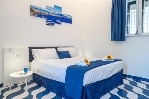 Letto o letti in una camera di Blumare Home