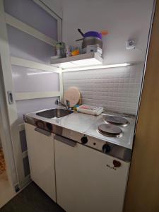 Kuchyň nebo kuchyňský kout v ubytování Sétány Apartman + 4 fotografie