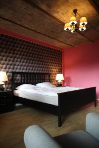 Postel nebo postele na pokoji v ubytování Hotel Hof Kirchhorst