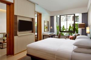 Courtyard by Marriott Bali Seminyak Resort客房内的一张或多张床位