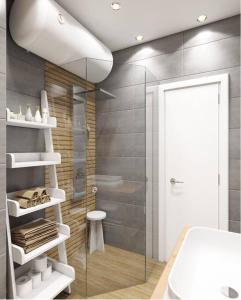 y baño con ducha, aseo y lavamanos. en 2 BED APARTMENT IN BANSKO RESORT en Bansko
