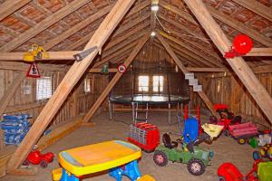 a play room with toys in a barn at Freizeit- und Erlebnishof Schötz in Elisabethszell