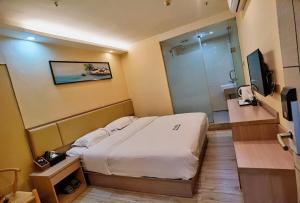 TV a/nebo společenská místnost v ubytování Songyuan Hotel 松缘酒店