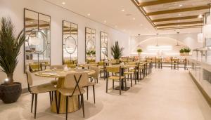 艾伍莲梅诺卡公寓餐厅或其他用餐的地方