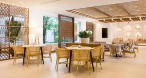 艾伍莲梅诺卡公寓餐厅或其他用餐的地方