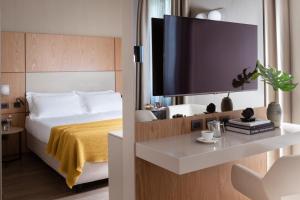 Ένα ή περισσότερα κρεβάτια σε δωμάτιο στο Hotel Cristoforo Colombo - Preferred Hotels & Resorts +29 φωτογραφίες