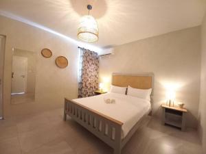 Postel nebo postele na pokoji v ubytování Bois Mapou Self Catering Apartments Unit 203