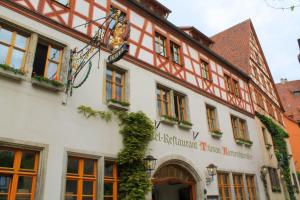 a building in the old town of bruges at Tilman Riemenschneider in Rothenburg ob der Tauber