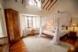 Voodi või voodid majutusasutuse Manuel Manor toas