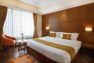 Letto o letti in una camera di Hotel Thrive, A Tropical Courtyard