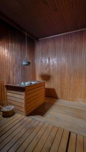 a room with a sauna with a wooden floor at Park Inn by Radisson Istanbul Asia Kavacik in Istanbul