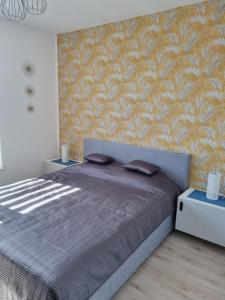 Posteľ alebo postele v izbe v ubytovaní Apartamenty Morze on Sea